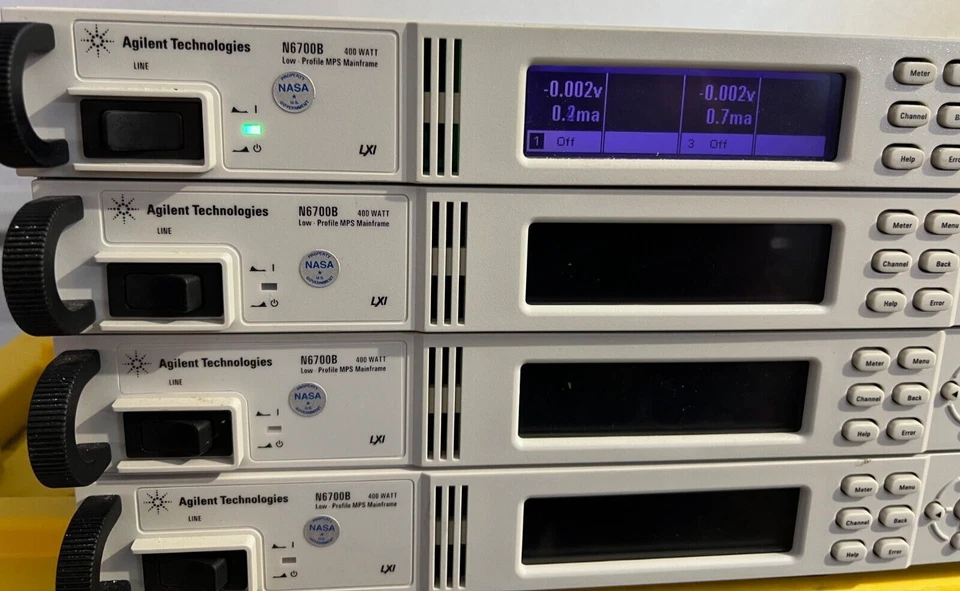 LOT OF 4 AGILENT TECHNOLOGIES N6700B Power Analyzers with N6753A POWER MODULES - Image 1 of 4