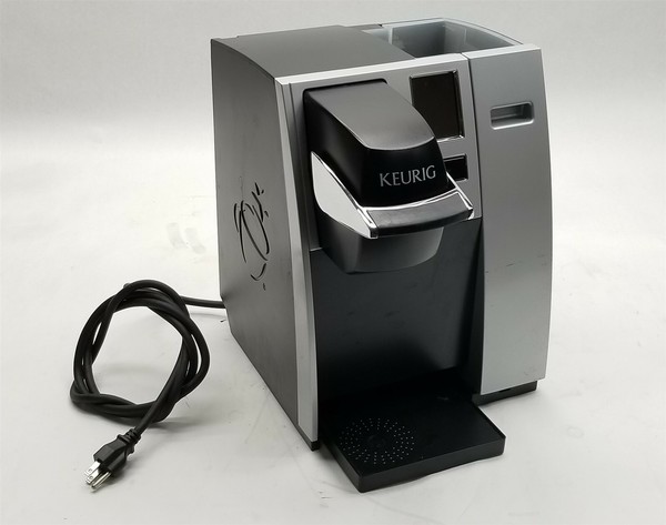 Comes With 6 to 12 oz. Brew Size, K-Cup Pod Storage, and Travel Mug... Photo Related