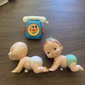 De colección 1977 TOMY plástico duro cuerda para bebé juguete años 80 años 70 par de 3 - Imagen 1 de 3