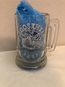 Taza de vidrio Moosehead Canadian Lager Beer 5 1/4" con mango 14 oz - Imagen 1 de 3