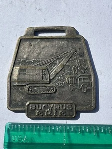 VINTAGE BUCYRUS ERIE CONSTRUCTION EARTH EQUIPMENT ADVERTISING BRASS WATCH FOB - Picture 1 of 4