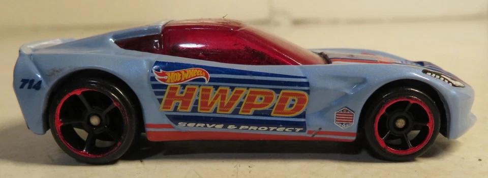 风火轮 2014 Corvette Stingray 1: 64 宽松浅蓝色马来西亚红色内衬轮辋 — 第 1/4 张图片