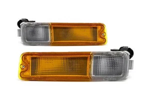 Mitsubishi L200 zestaw kierunkowskazów przednich 96-06 przezroczyste pomarańczowe wzmacniacze lewe prawe - Zdjęcie 1 z 12