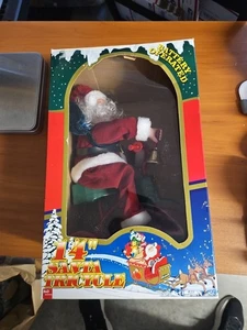 MOTION & MUSICAL CICLISMO SANTA CLAUS TRICICLO 14" PELUCHE NAVIDAD - FUNCIONA NUEVO EN CAJA - Imagen 1 de 5
