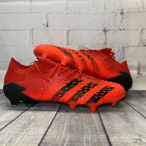 red adidas cleats