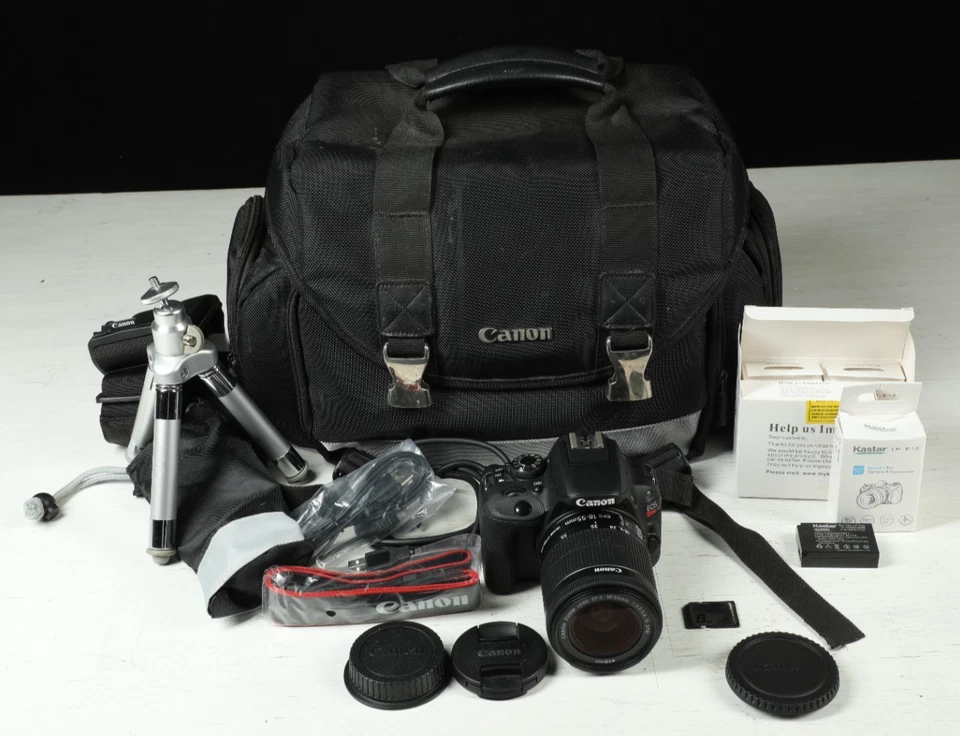 Canon EOS Rebel SL1 Camera Outfit EF-S 18-55 f 3.5-5.6 lens, extra batts,   case - Image 1 of 4
