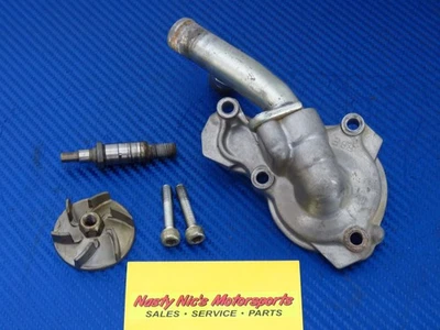 07 Yamaha WR450f OEM BOMBA DE AGUA tapa junta impulsor hélice eje tapa refrigeración Foto 1 de 4