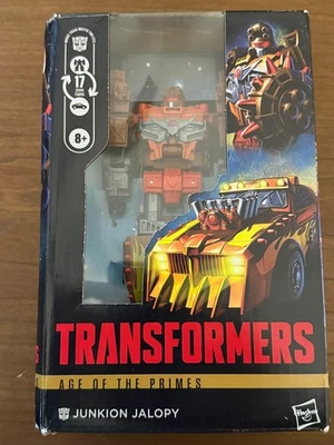 Transformers Age Of The Primes Deluxe Class 2026 Wave 1 Junkion Jalopy EN STOCK Foto 1 de 4