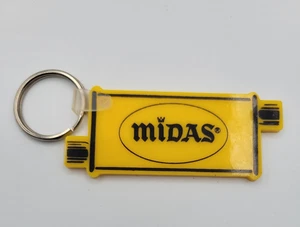 Llavero silenciador vintage Midas amarillo - Imagen 1 de 3