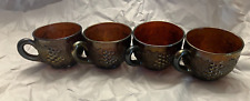 4 Dugan amethyst carnival glass punch cups in the grape delight pattern