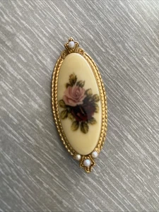 Broche prendedor de rosas ovaladas en tono dorado marca 1928 - Imagen 1 de 8