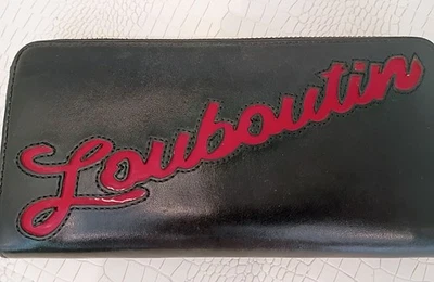 Raro Christian Louboutin Panettone Negro Piel de becerro Zippy/Rojo “Louboutin” Cursiva Foto 1 de 4