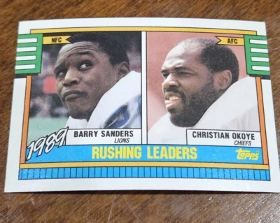 1990 Topps #28 Rushing Leaders Football Card Barry Sanders Christian Okoye - Image 1 of 2