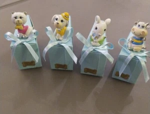 24 PZ BOMBONIERA NASCITA BATTESIMO ANIMELETTI MUCCA TOPOLINO CAGNOLINO GATTINO - Foto 1 di 5