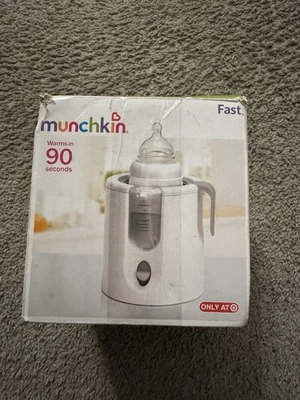 Calentador rápido de botellas Munchkin se calienta en 90 segundos Foto 1 de 4