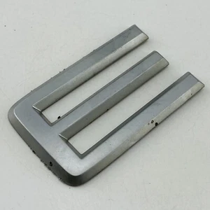 2001-2004 Nissan Frontier Emblem Badge Logo Letter Tail Gate Rear OEM E66E - Picture 1 of 6