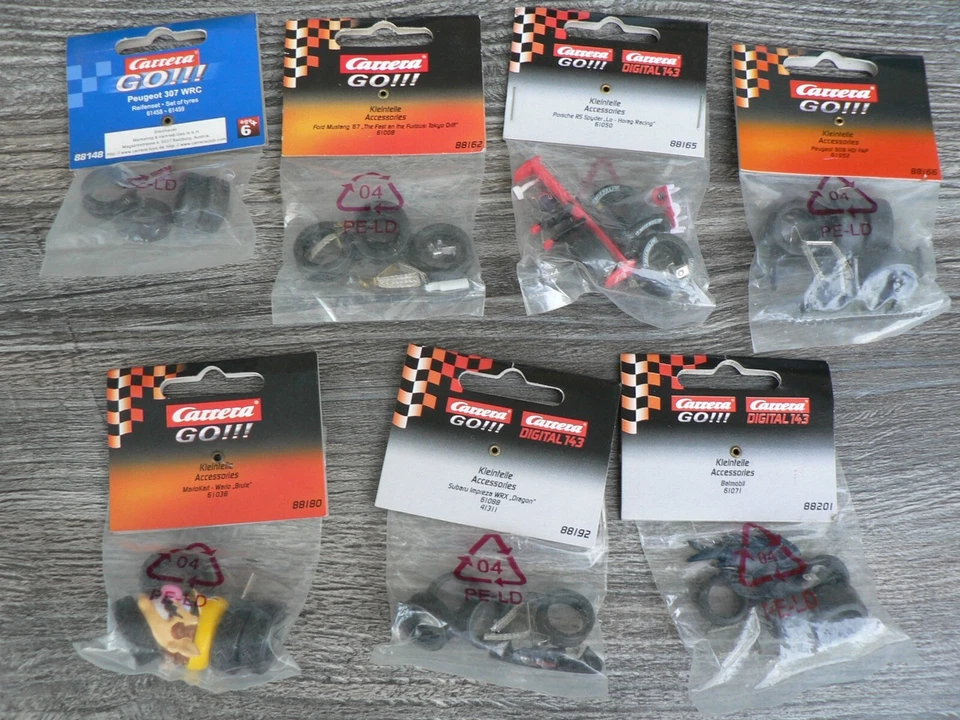 Verschiedene Carrera Go Ersatzteilsets Reifen Spoiler Schleifer Leitkiel etc. - Bild 1 von 1