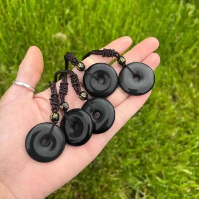 Collar de protección amuleto curativo colgante donut moneda obsidiana negra natural Foto 1 de 4