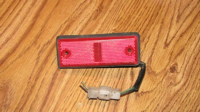  84-91 MITSUBISHI MONTERO DODGE RAIDER LUZ MARCADORA TRASERA DERECHA OEM PASAJERO Foto 1 de 2