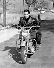 ELVIS PRESLEY LEGENDARY ENTERTAINER RIDING MOTORCYCLE - 8X10 PHOTO (BT882)
