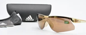 Gafas de sol ADIDAS a153 00 6051 disco Wrap LST Golf semimarca oro ultraligeras - Imagen 1 de 10
