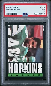 Topps #129 Wes Hopkins 1985 PSA 7 casi como nuevo novato radiocontrol Philiaphia Eagles - Imagen 1 de 2