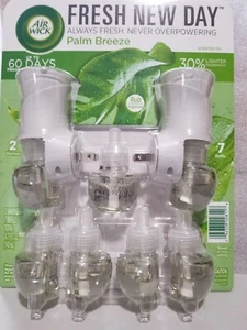 Air Wick Air Freshener Scented Oil Plug In Palm Breeze 2 Warmers & 7 Refills - Picture 1 of 4