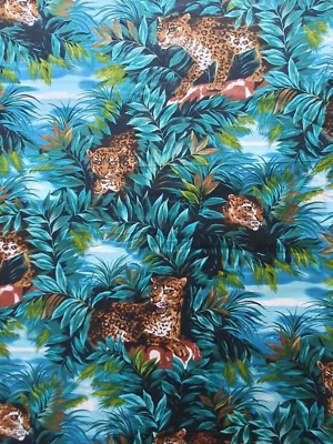 Fabric Jungle Island Leopard Vivid Turquoise Green 100% Cotton 42" w x 3+ Yards. - Image 1 of 4