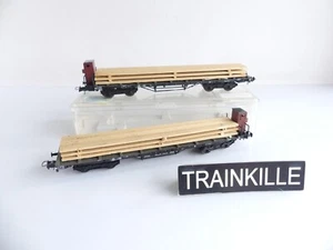 46491 / ROCO HO 2 WAGONS PLATS A BOGIES SNCF AVEC CHARGEMENT  PLANCHES - Imagen 1 de 5