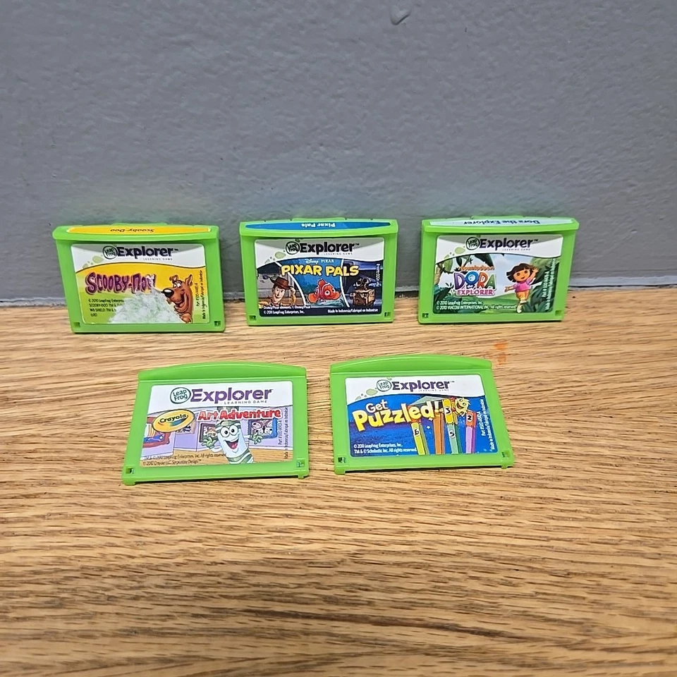 LeapPad Explorer Learning Games Dora, Scooby Doo, Art, Puzzled, Pixar  Lot Of 5 - Image 1 of 4