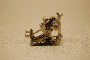 ASSORTED PARTS FOR A SINGER MODEL **** SEWING MACHINE. ATTACHMENT THING - Picture 1 of 1