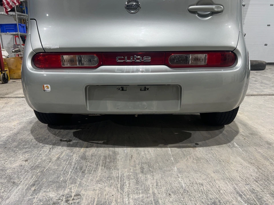 2009 - 2010 Nissan Cube Chrome Silver Metallic-KY0 Rear Bumper (NO Tail Lights) - Image 1 of 4