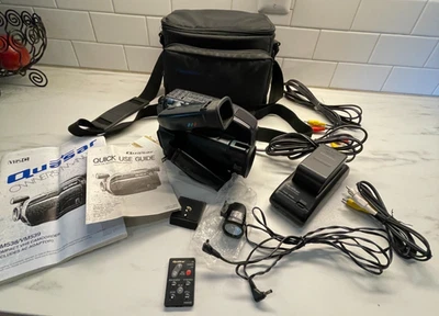 Quasar VHS C QUARTERBACK EIS DIGITAL X100 Video Camera With Accessories Tested - Image 1 of 4