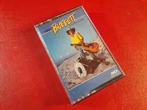 1984 Jimmy Buffett / Riddles in the Sand / Album Cassette Tape / NICE AND TESTED - Picture 1 of 12