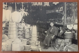 Man Sitting Inside a Hardware Ship Yokohama, Japan Vintage Postcard c1932 - Picture 1 of 2