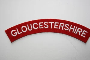 TÍTULO DE HOMBRO DE TELA DEL REGIMIENTO GLOUCESTERSHIRE PATRÓN DEL EJÉRCITO BRITÁNICO SEGUNDA GUERRA MUNDIAL - Imagen 1 de 1