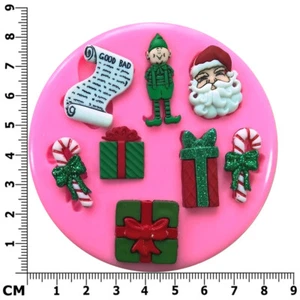 Molde de silicona para cupcakes Christmas Naughty Elf Santa Presents de Fairie Blessings - Imagen 1 de 6