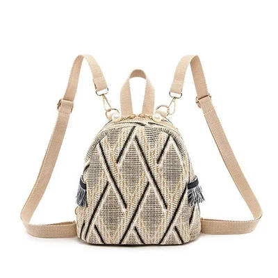 Women Lightweight Grass Woven Backpack Leisure Travel Bag with Geometric Tassel - Image 1 of 4