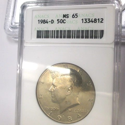 1984-D Kennedy 50c ANACS **MS65** UNTONED Old White Holder Cover