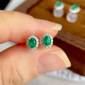 2.50Ct Oval Cut Simulated Emerald Women's Stud Earrings 14K White Gold Plated - Picture 1 of 3