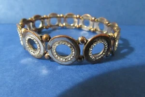 Bronze/copper colored link stretchy bracelet -note some TINY missing rhinestones - Picture 1 of 5