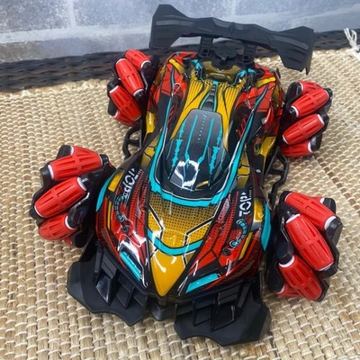 NEW Multi-Function GoolRC Stunt Car, Remote Control 2 remotes Lights music water - Image 1 of 4