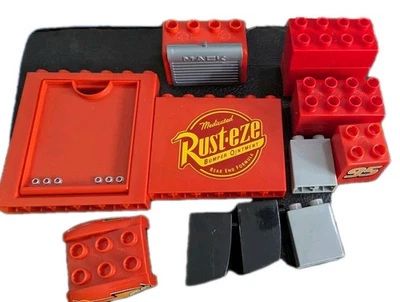 Lote de piezas de repuesto de paneles laterales Mega Bloks Disney Cars Macks RustEze  Foto 1 de 4