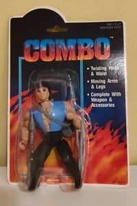 ACTION FIGURE COMBO HERO RAMBO BLUE VEST VINTAGE MOTU BOOTLEG MOC BLISTER - Imagen 1 de 5