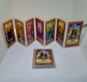 7 ARCANGELES ESTAMPITAS PLASTICADAS CON ORACION ESTILO FISARMONICA! - Foto 1 di 4