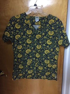 Blusa Médica UA para Mujer Azul con Estampado Floral Verde, Amarillo, Rojo y Púrpura Talla XS  Foto 1 de 4