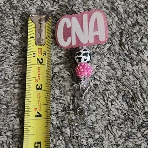 Clip de identificación de cordón de carrete de insignia CNA  - Imagen 1 de 4