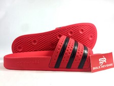 red adidas flip flops
