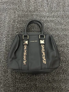Borsa Victoria Secret in ecopelle nera con strisce di ghepardo e borchie borsetta - Foto 1 di 10