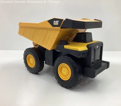 Camión de volteo de vehículo de construcción de juguete fundido a presión de metal y plástico CAT Foto 1 de 4